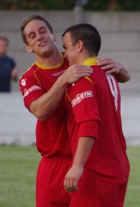 Ossett Town midfielder Richard Patterson hugs Rob Bordman after his goal