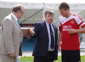 NCEL chairman David Morrall presenting Knaresborough Town captain Matt Dureden to Toolstation's commercial director Neil Carroll before the game