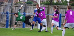 Garforth Town goalkeeper Ben Hunter is beaten for Farsley AFC's first goal