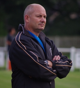 Nostell Miners Welfare manager Darren Holmes was "very pleased" with his side's showing in the 3-2 defeat at Brighouse Town