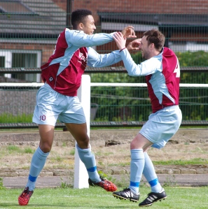 Michael Tunnacliffe (right) celebrates with Ruben Jerome after the decisive second goal in AFC Emley's 2-1 FA Cup win over Ashton Athletic