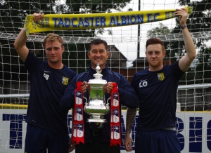 George Bissett (left), Tadcaster manager Paul Marshall and Liam Ormsby (right) with the FA Cup