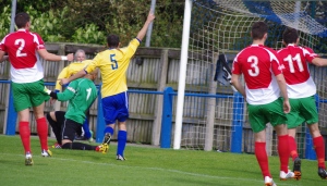 Andy Hawksworth waves his hands in the air after Curtly Martin-Wyatt puts Garforth Town in front