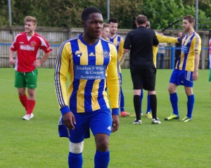Red mist: Tawanda Rupere leaves his Garforth Town team-mates to fight out the final few minutes
