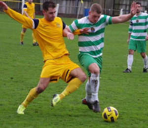 Liam Kellett steals the ball from Tadcaster's former Newcastle United youngster Nicky Deverdics