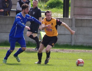 Adam Muller on the attack during Ossett Albion's 3-0 defeat to Padiham
